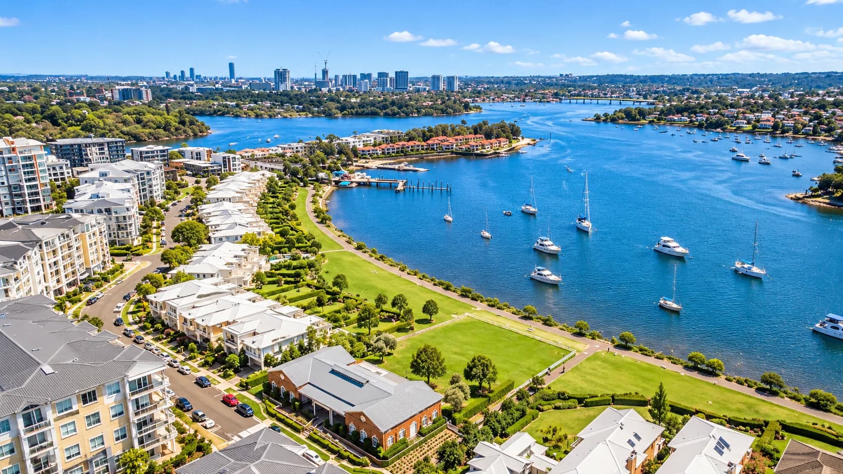 Waterfront apartments, parkland and river views