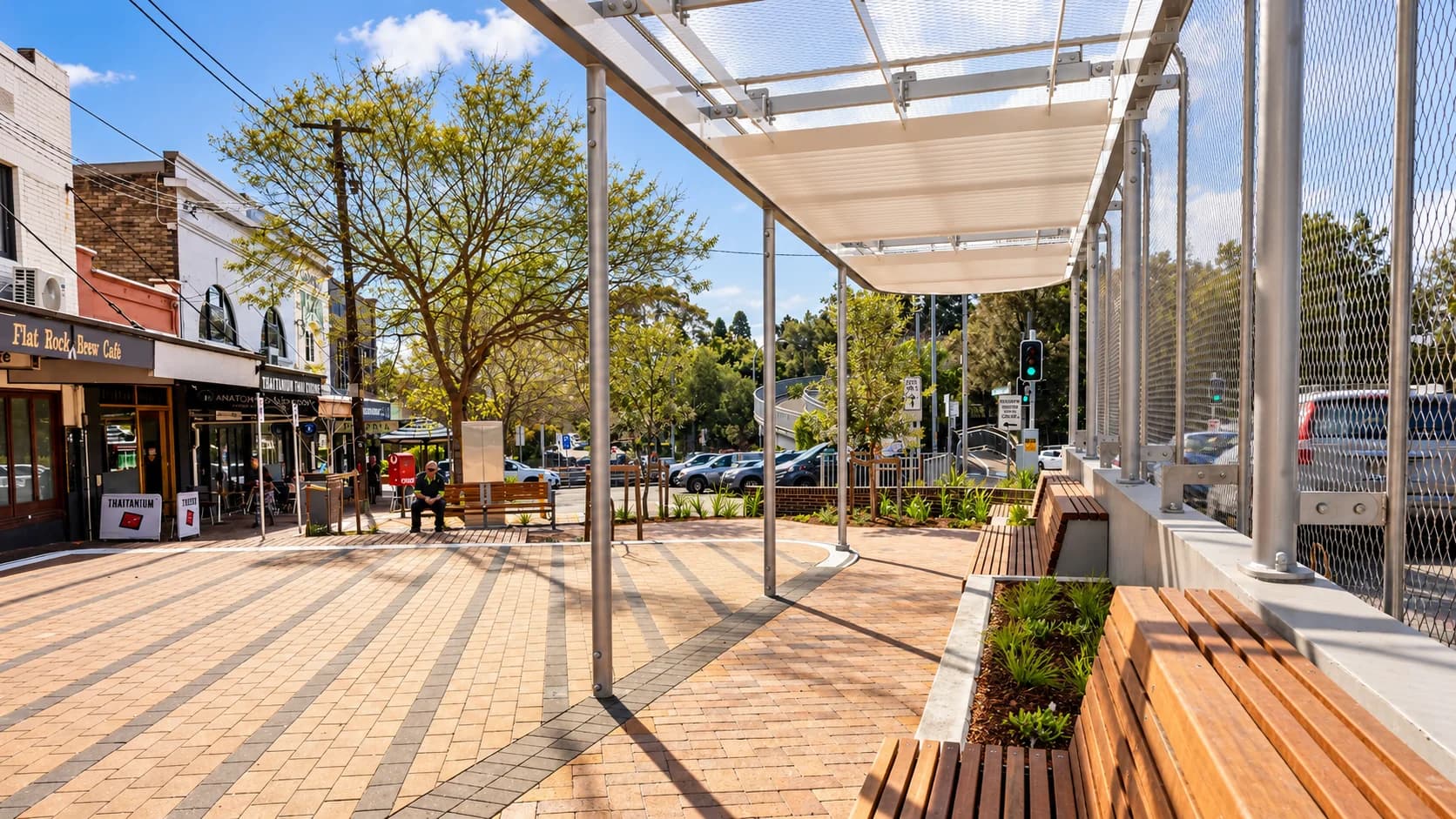 Neighbourhood shopping strip and covered bus stop
