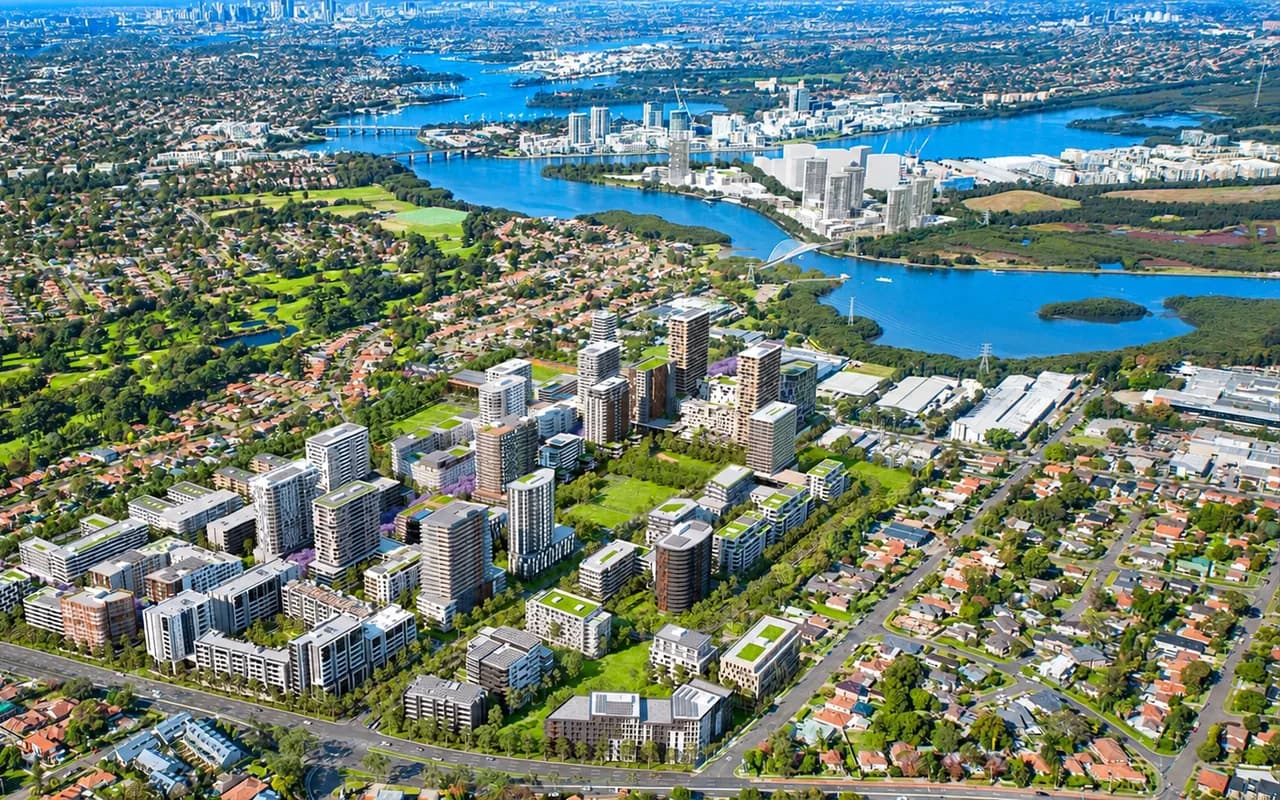 Aerial view of residential buildings and the river in Melrose Park