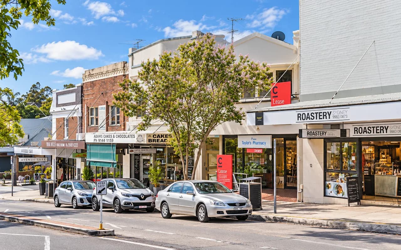 Local shops and cafes beside a street in Turramurra